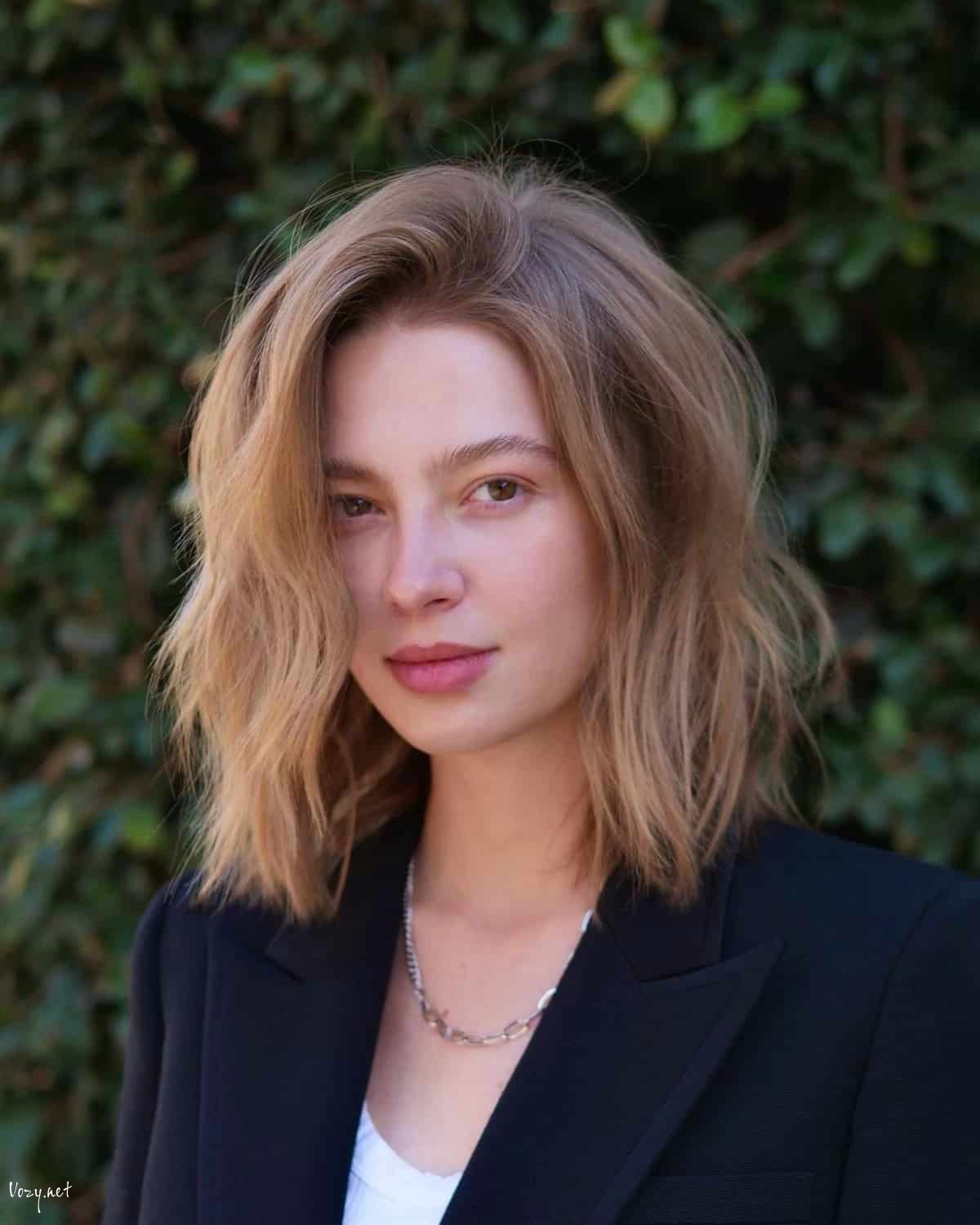 medium shaggy a line bob layered hairstyle