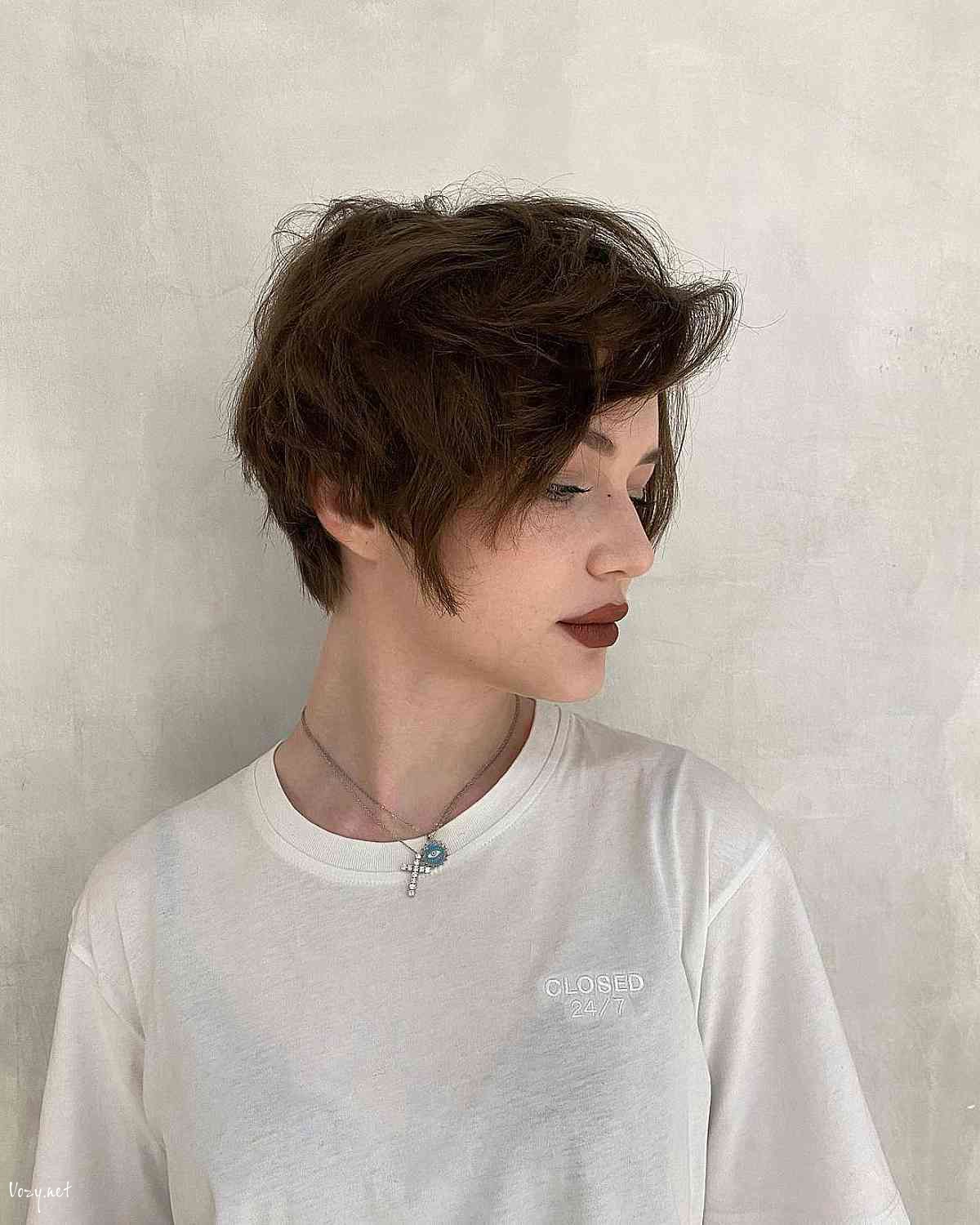 messy dark brown pixie bob