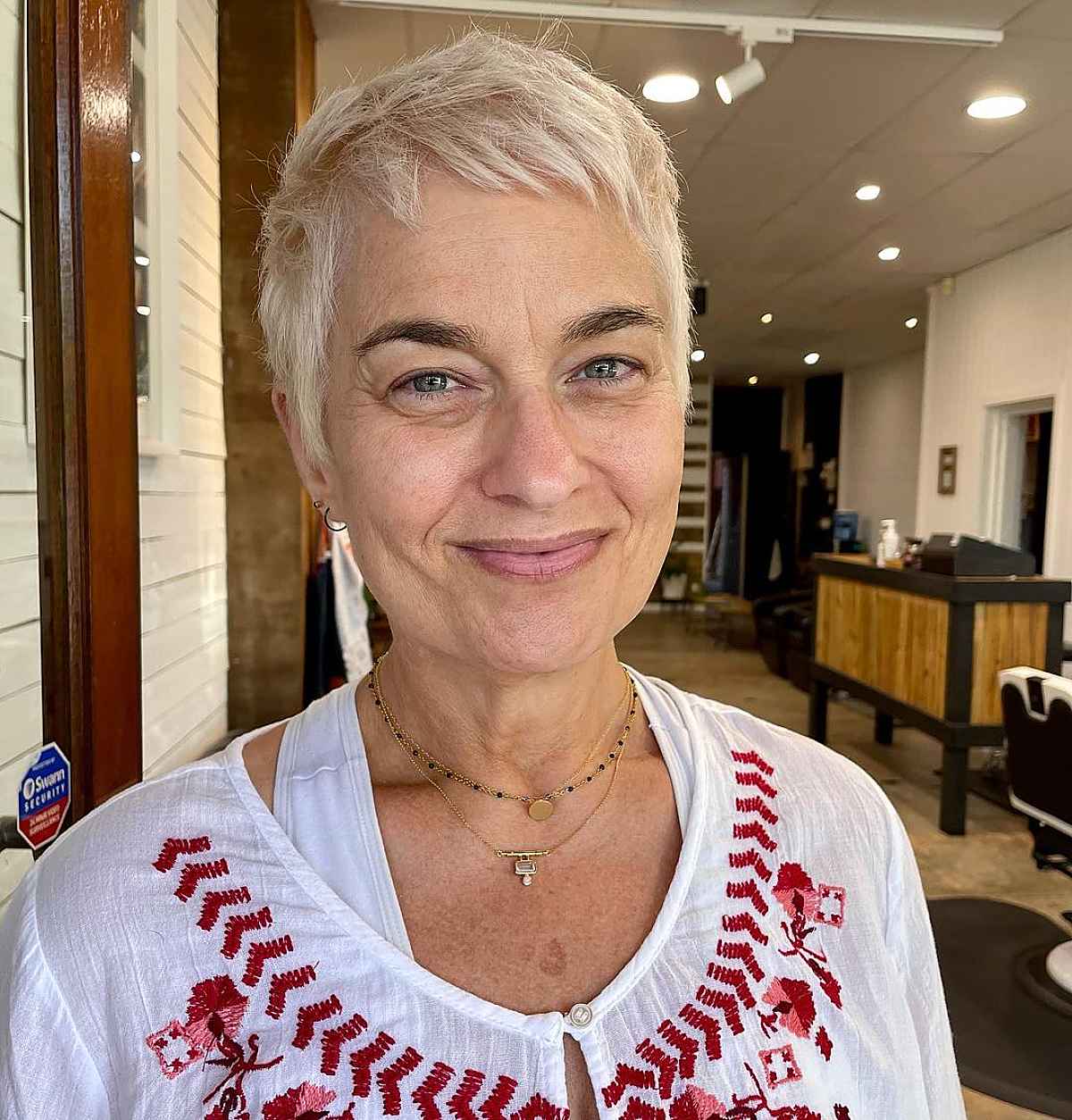 messy pixie for woman over 50 years old with square faces and fine hair