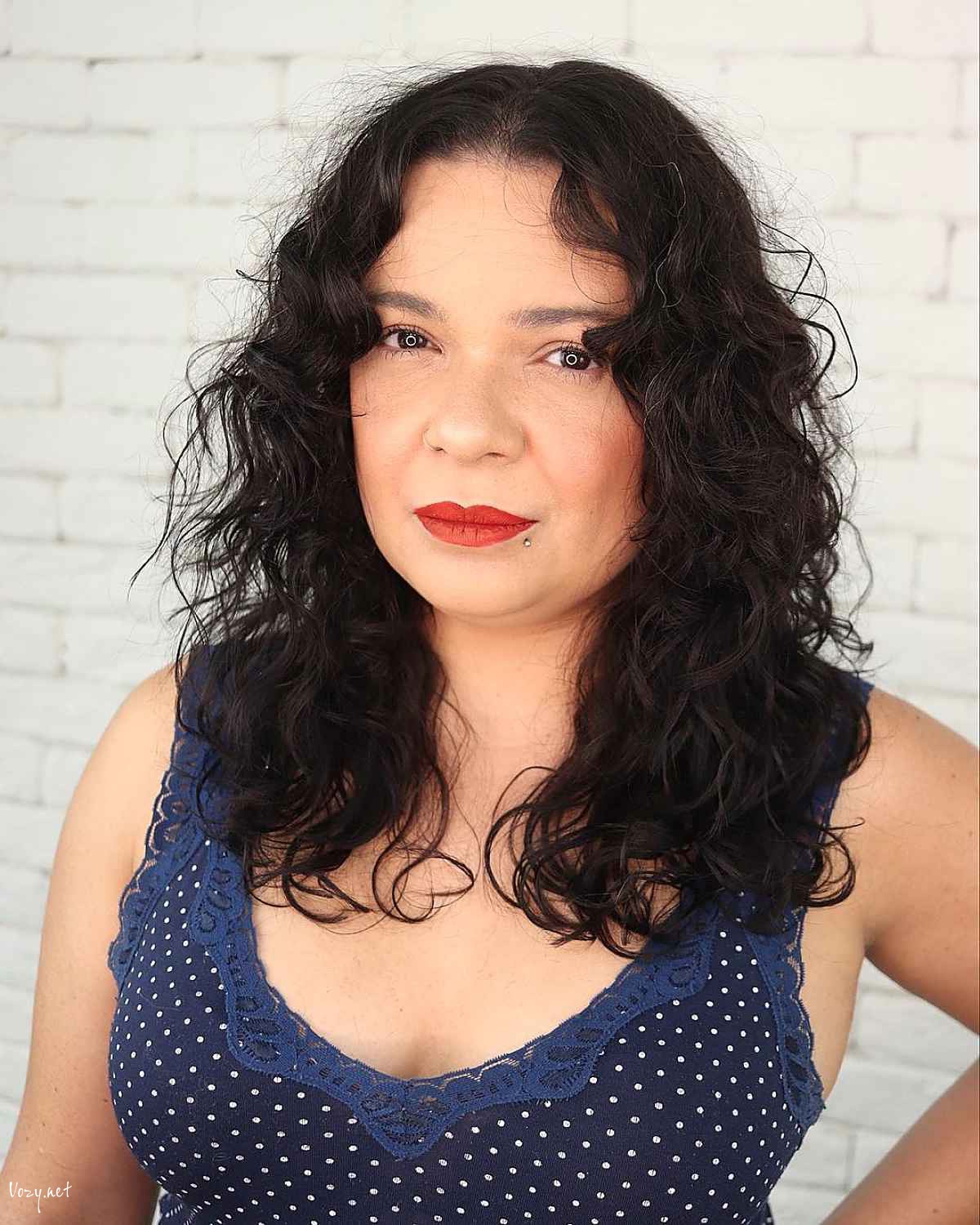 mid length curly shag for dark hair 1