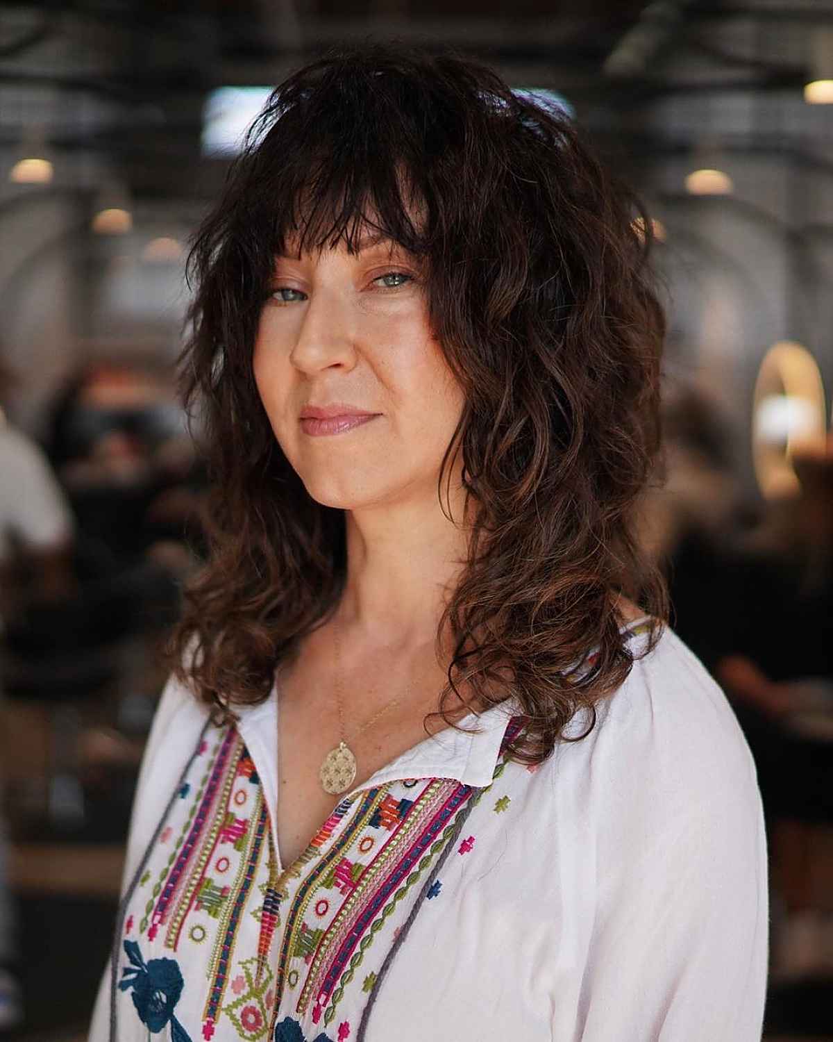 mid length curly shag with fringe