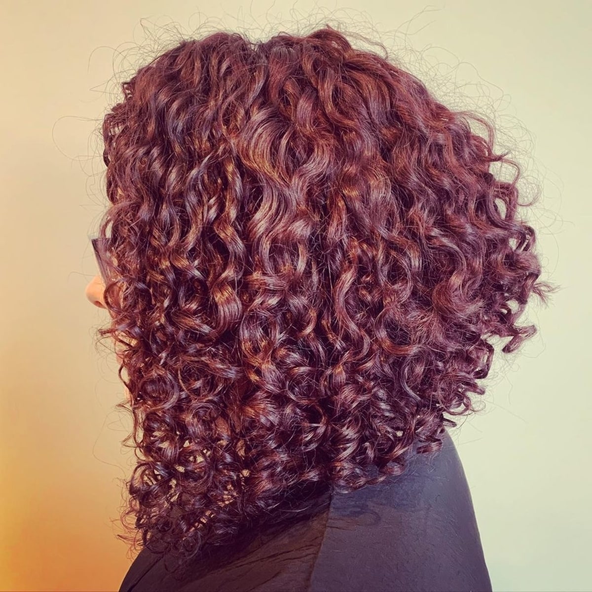mid length inverted bob for curly locks