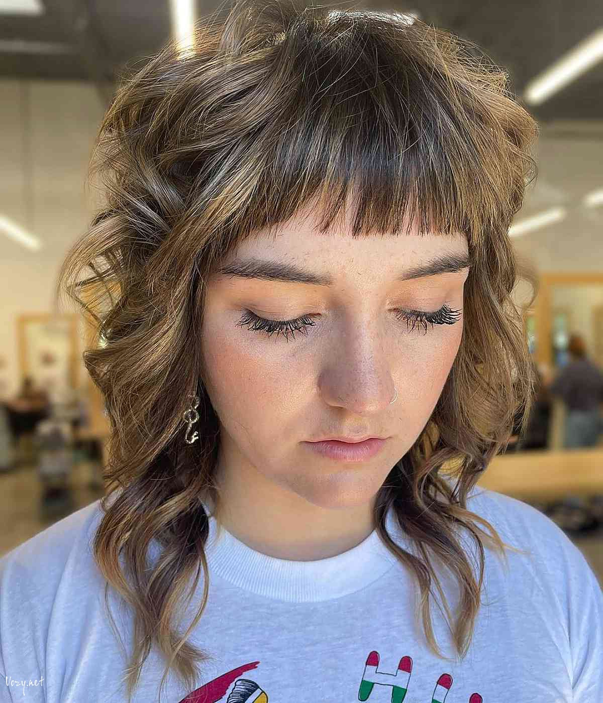 mid length shag with short blunt bangs 1