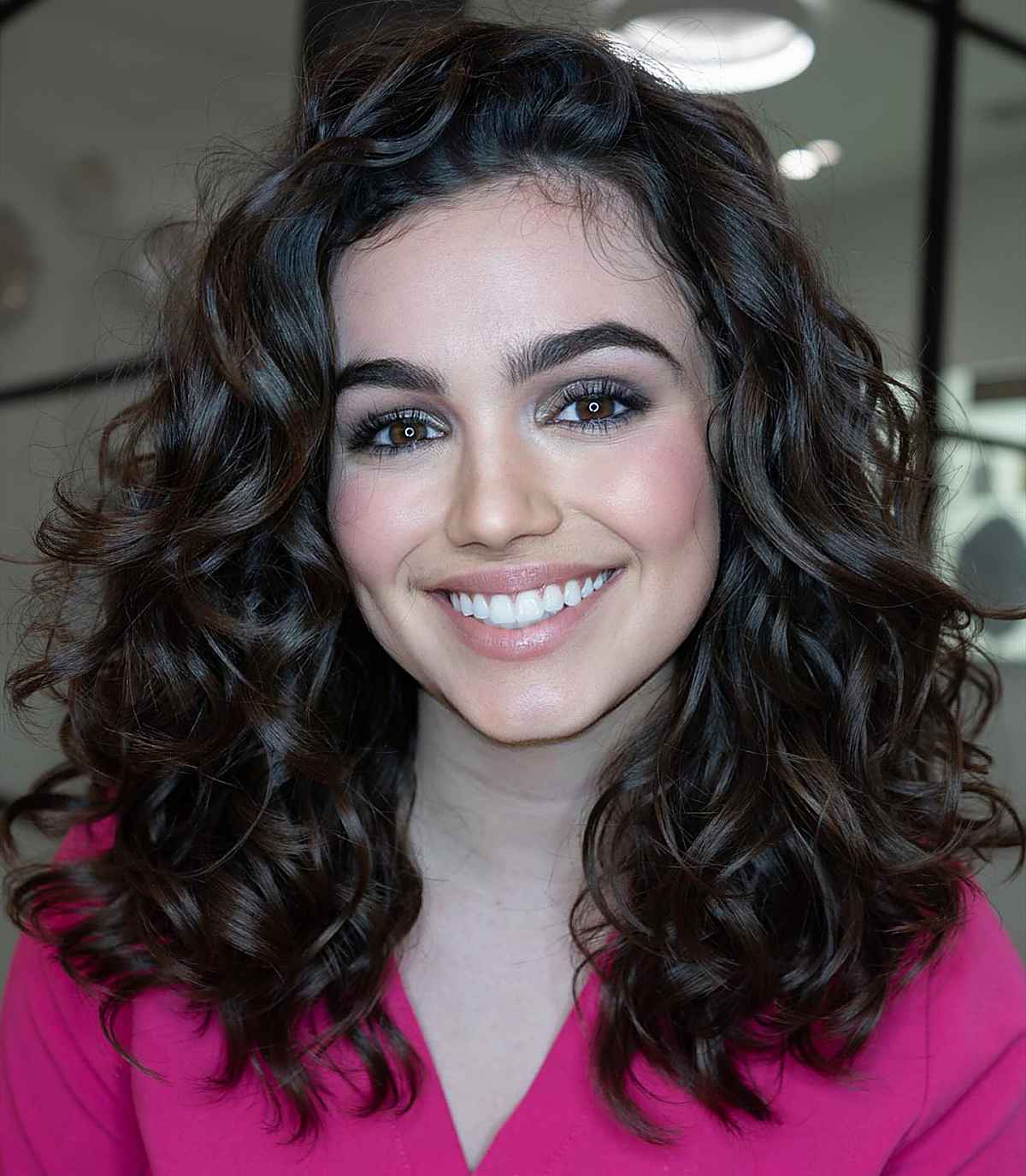 natural curls with a side part for medium curly hair