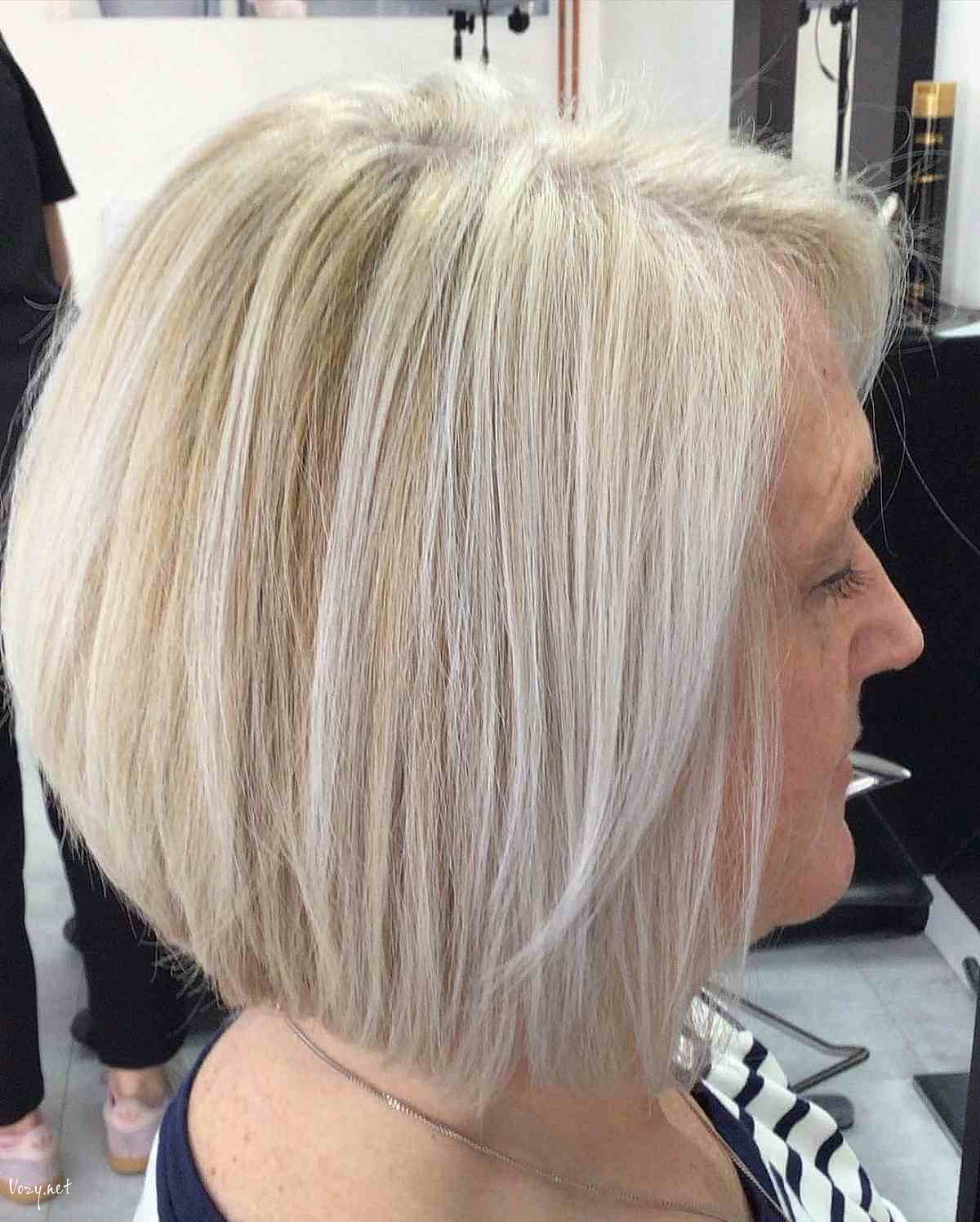 neck length angled bob with choppy ends for 50 year old women
