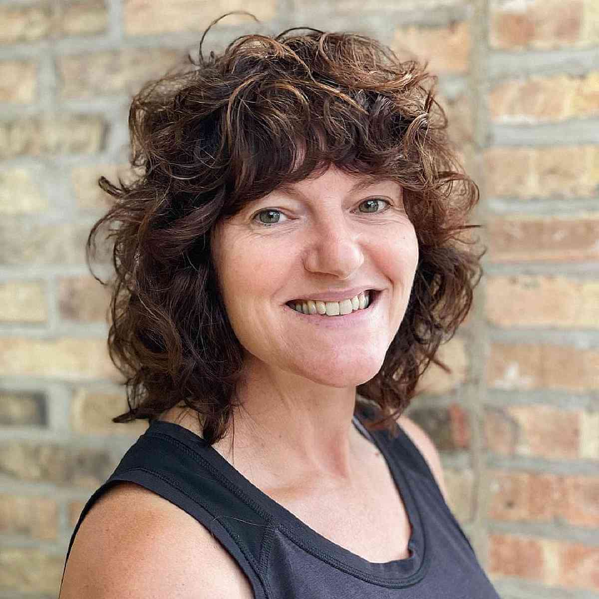 neck length shaggy bob on curly hair for fifty year old women