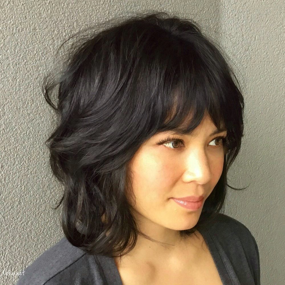neck length wavy shag with bangs