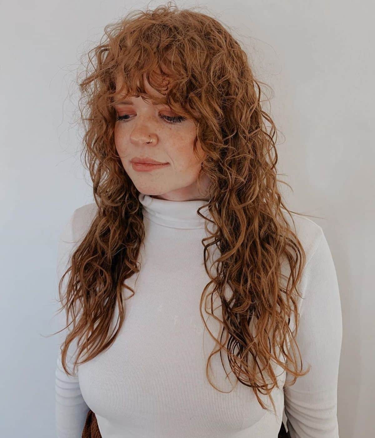 permed natural hair with bangs