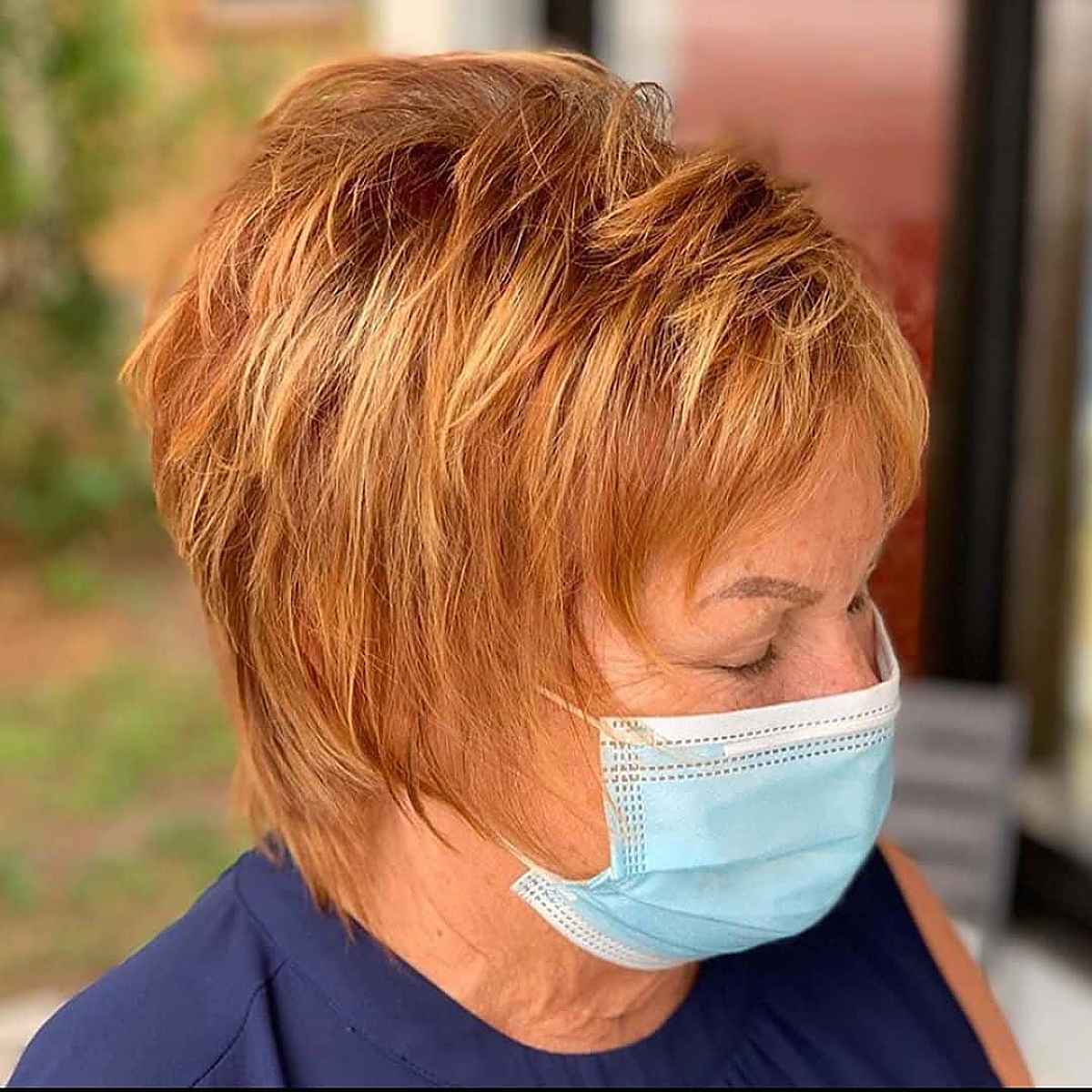 pumpkin spice and blonde highlights fall hair color for elderly lady