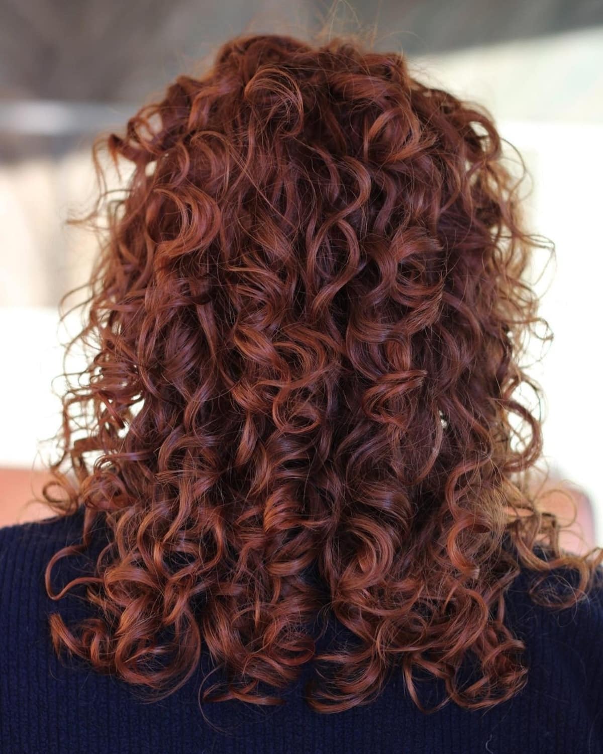 red medium to long curly hair