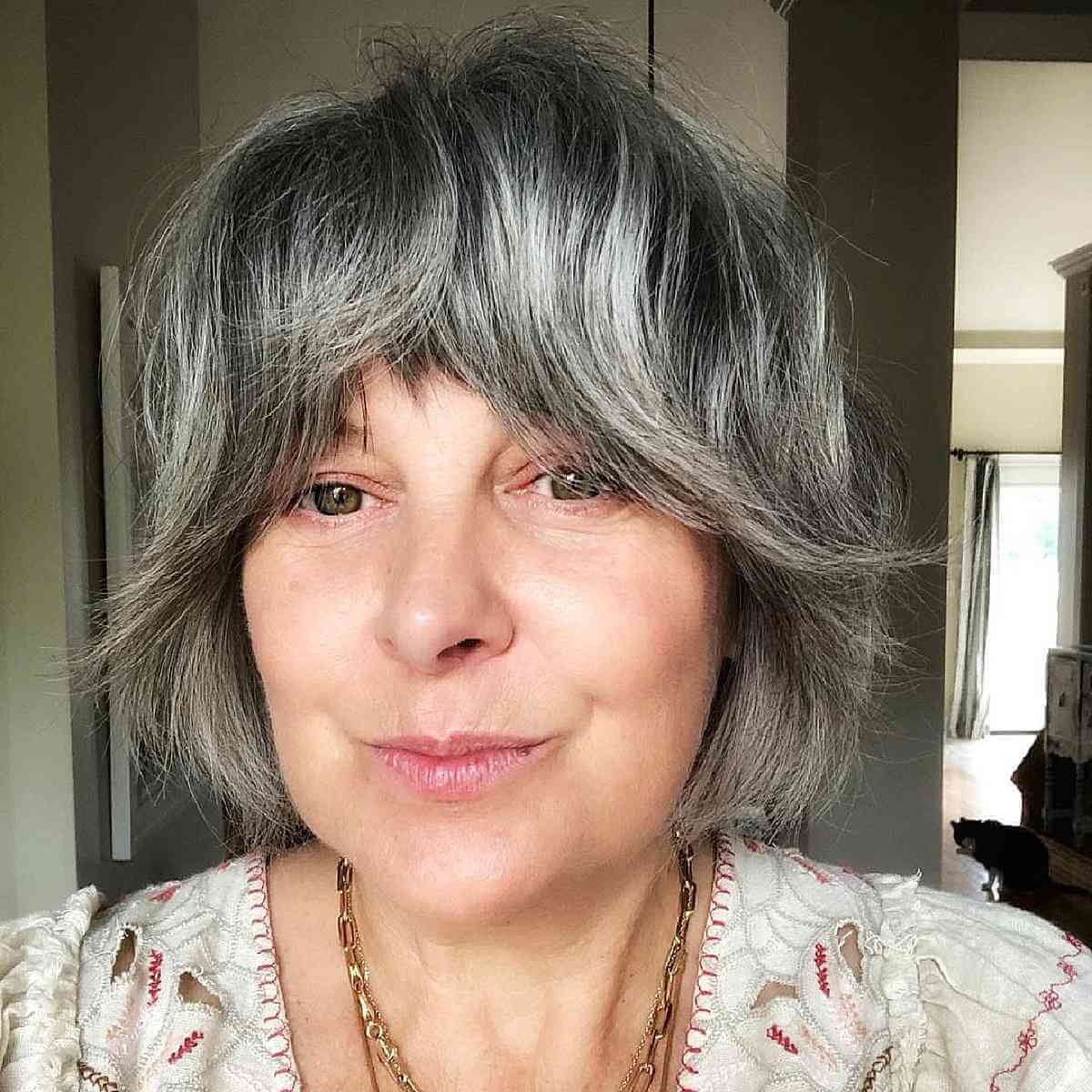 shagged cut with face framing bangs for ladies over 50