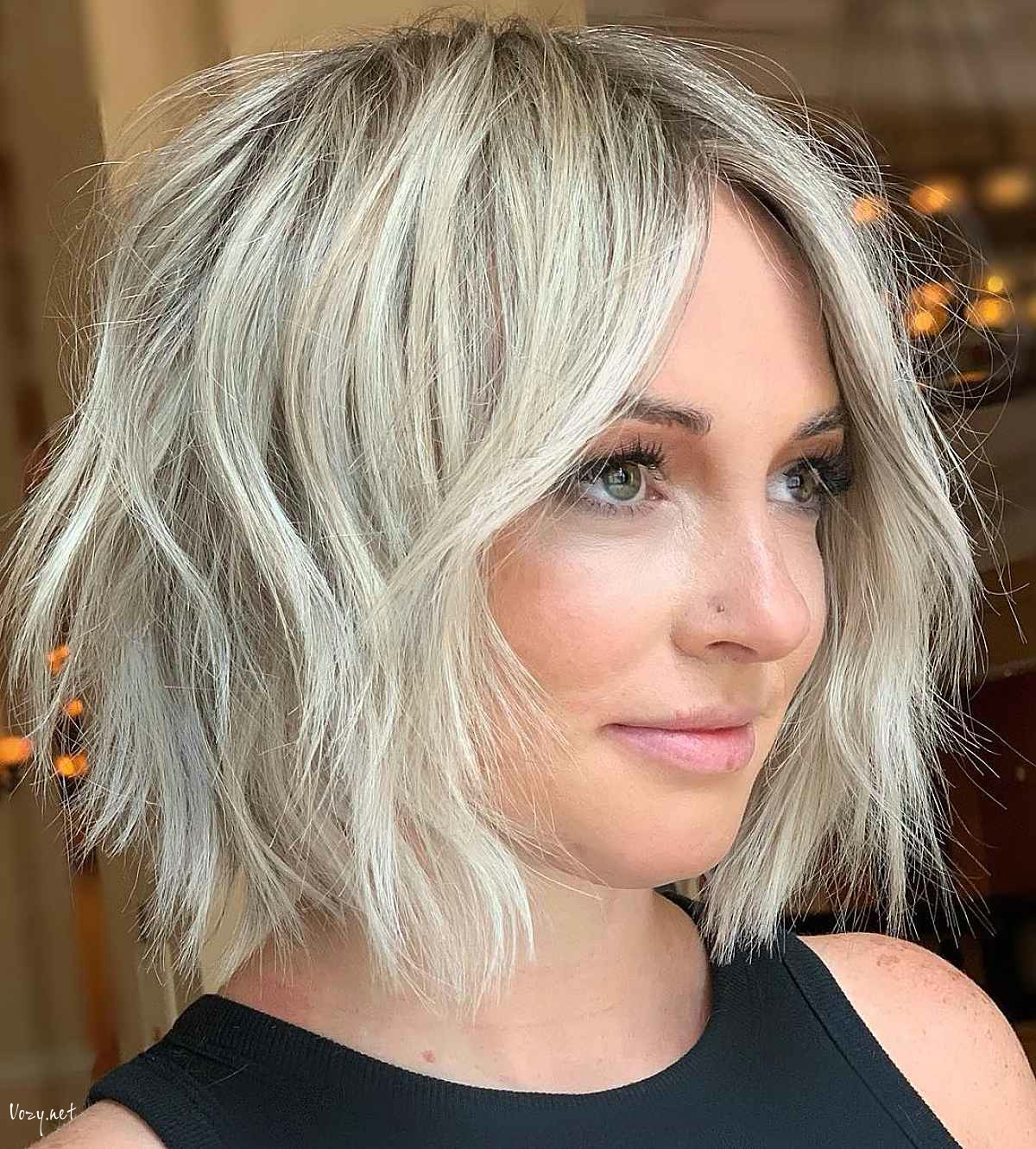 shaggy bob with center part bangs