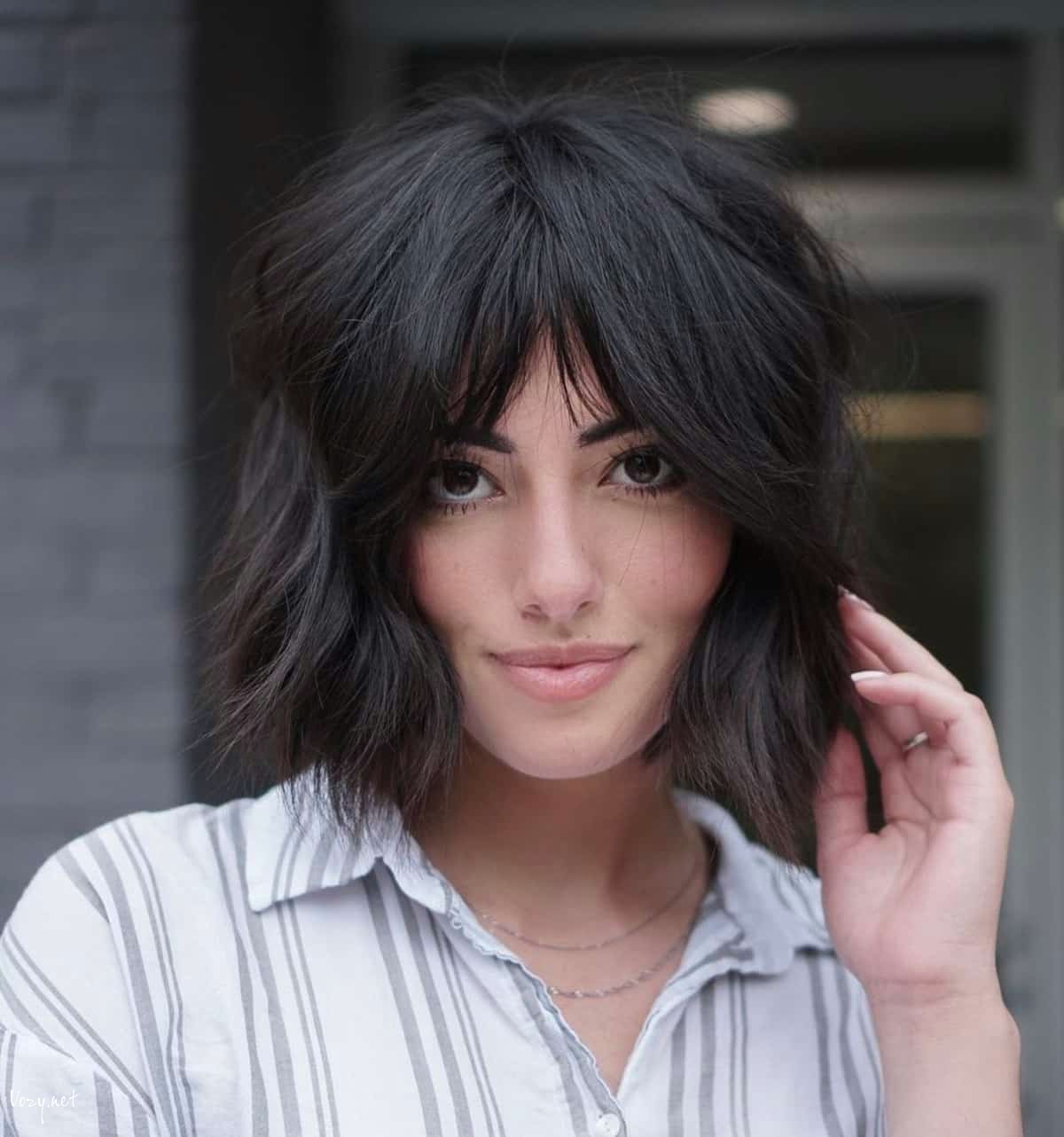 shaggy bob with long curtain bangs hairstyle