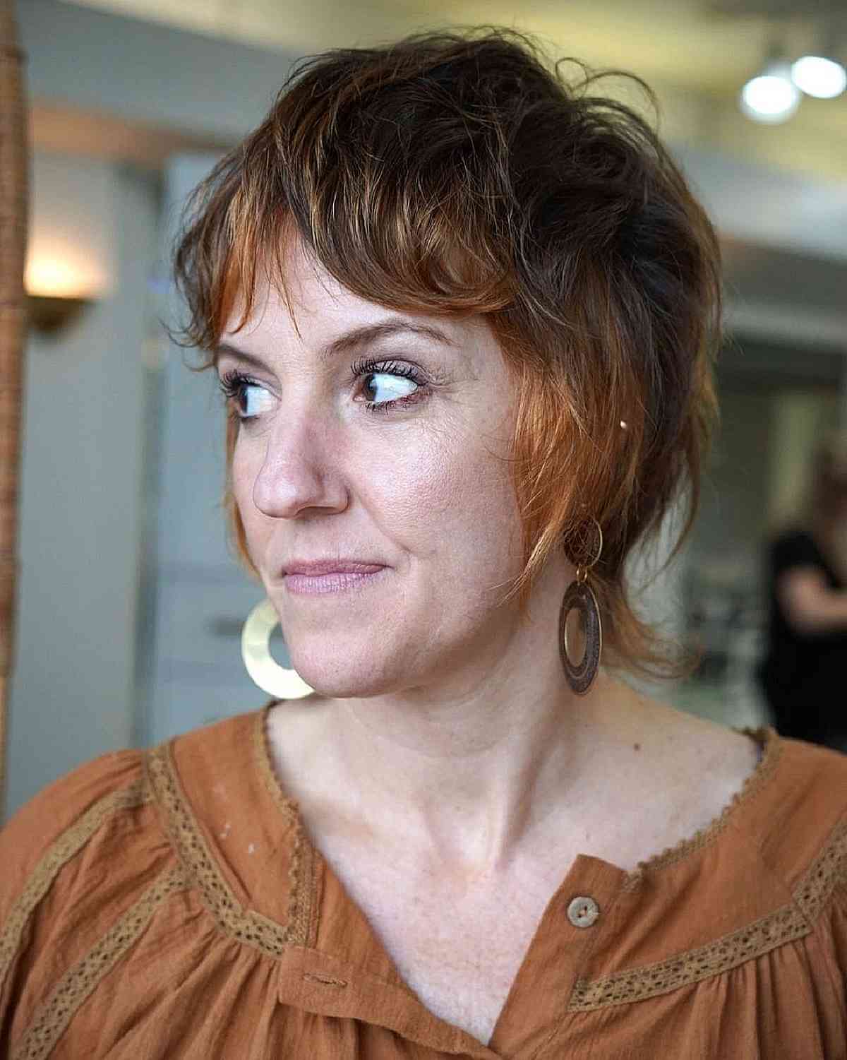 shaggy pixie mullet with a curtain fringe for women over fifties