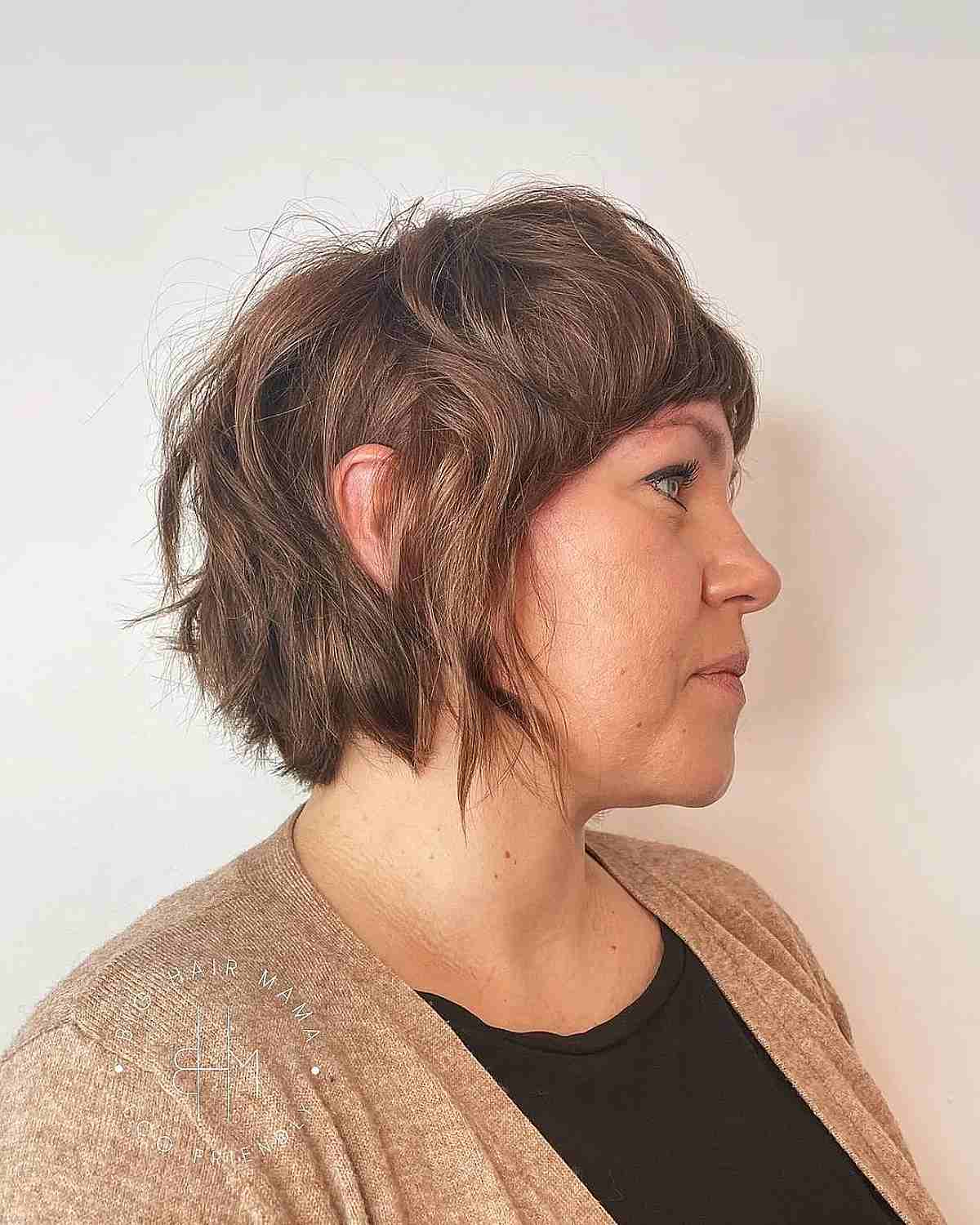 short chin length disheveled shag mullet and bangs