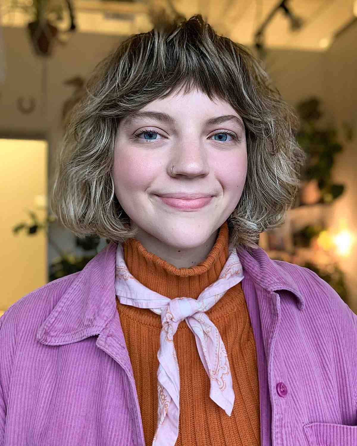 short face framing textured shag bob with mini choppy bangs