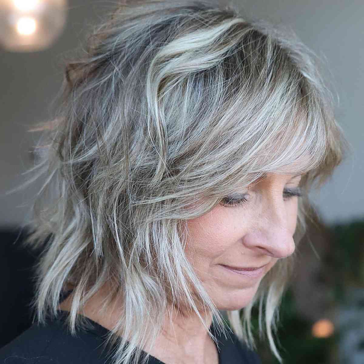 short hairstyle with soft waves woman over 40
