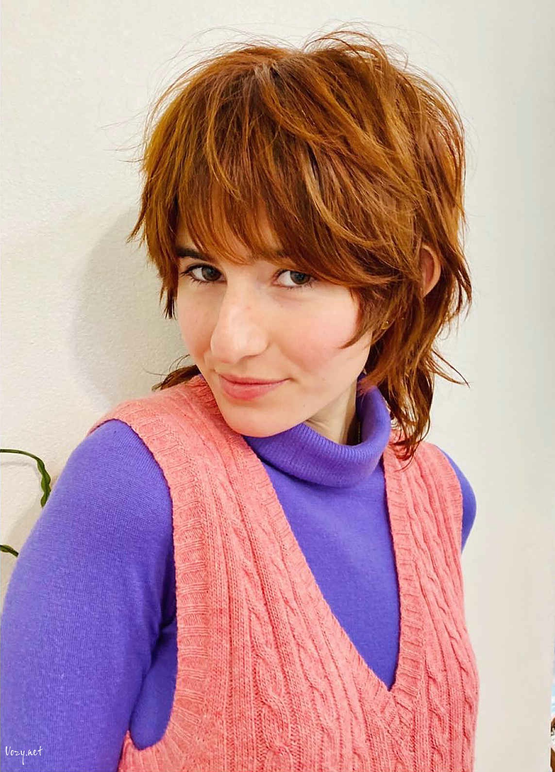 short shag with bangs and longer in the back