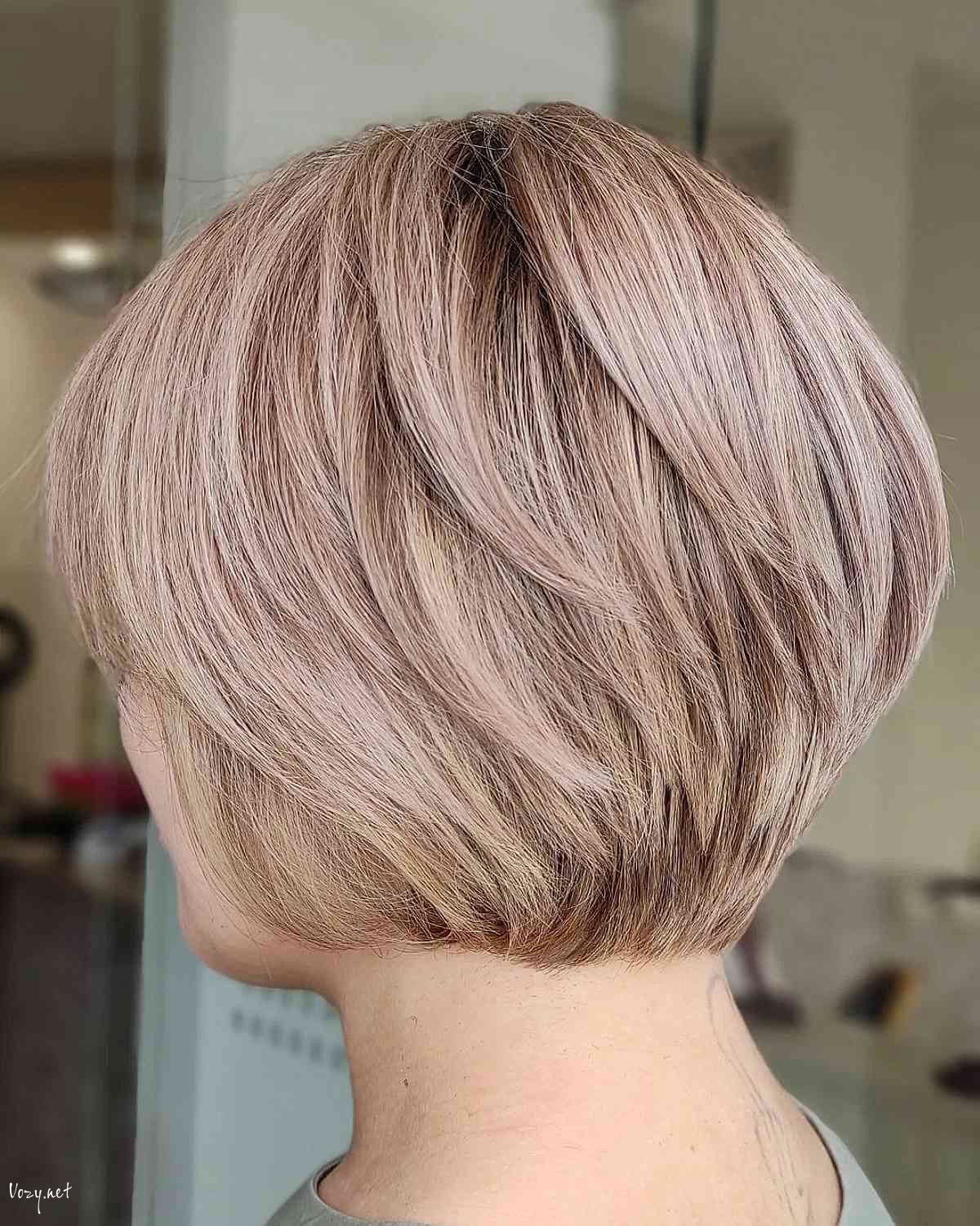 short soft rose gold bixie cut