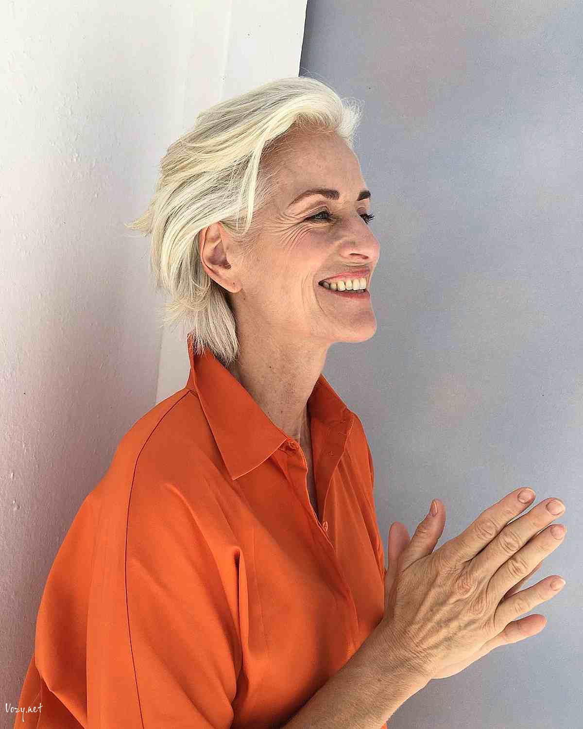 short swept back feathered hair for women 50 and over