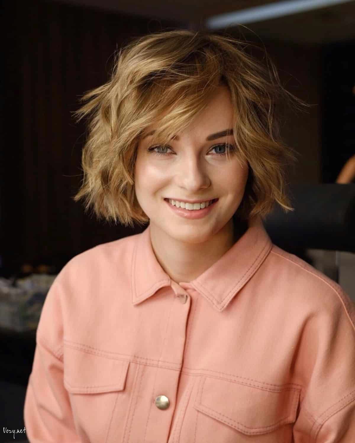 short textured shag with side swept bangs hairstyle