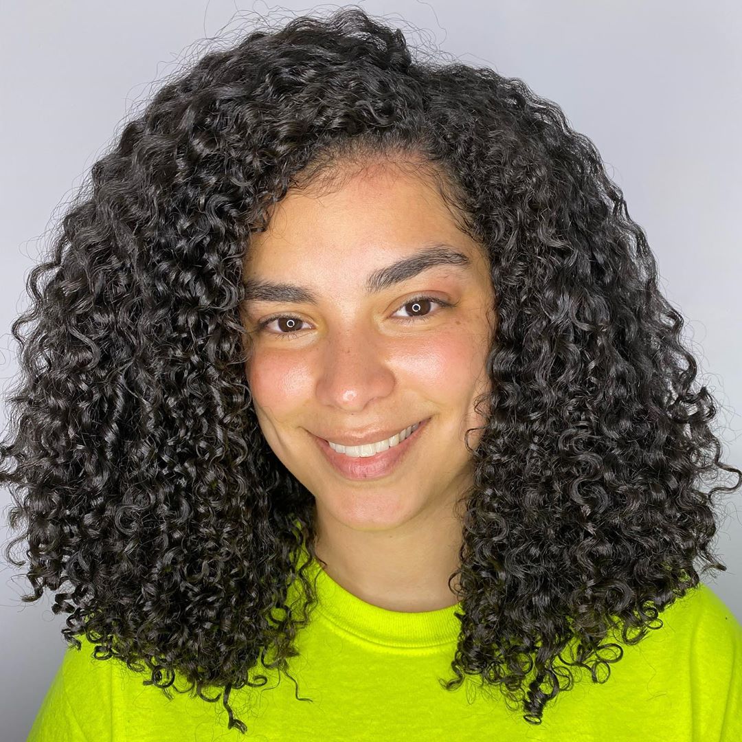 short tight curls on medium hair