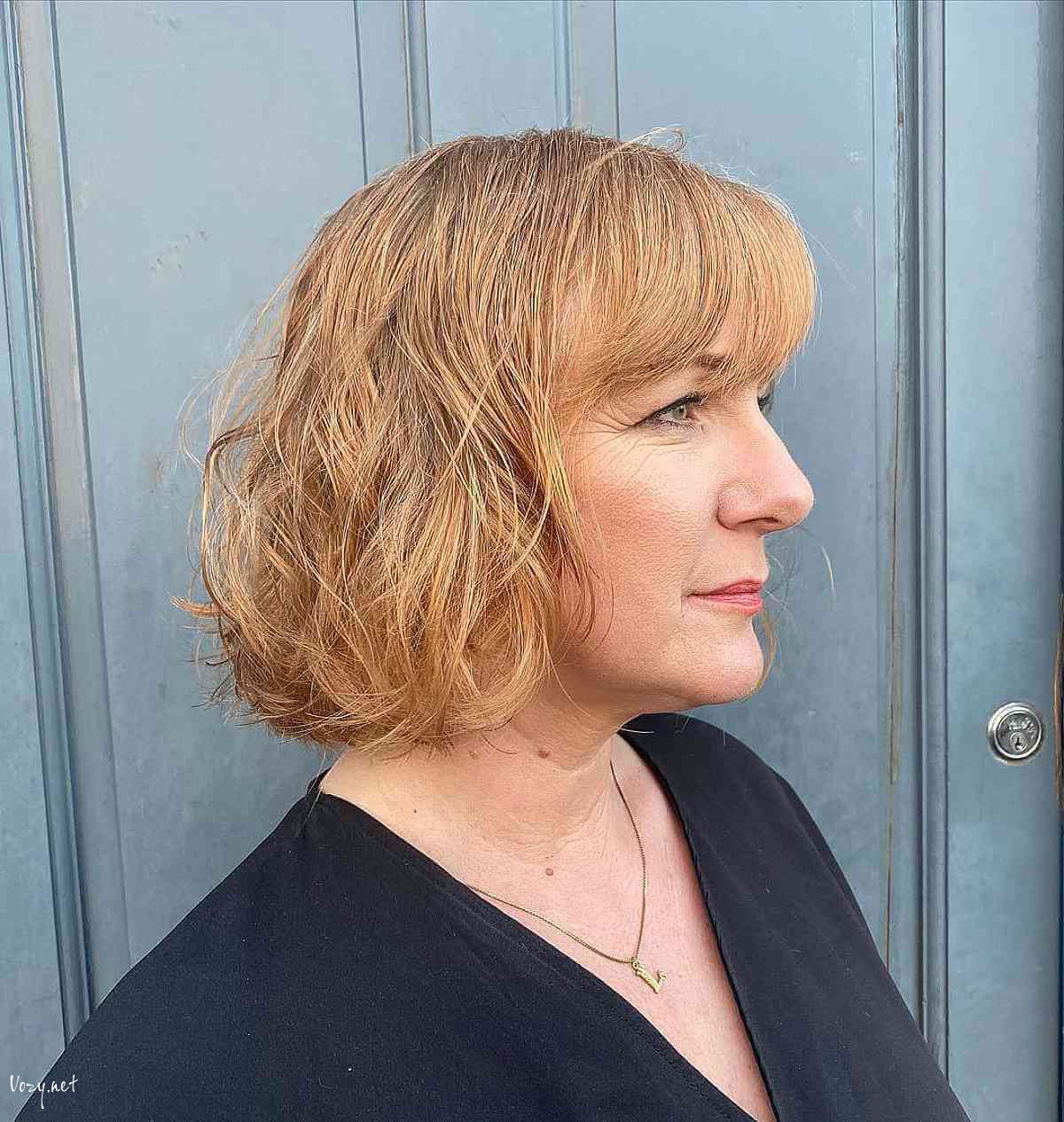 short wavy bob with straight bangs for ladies over 50
