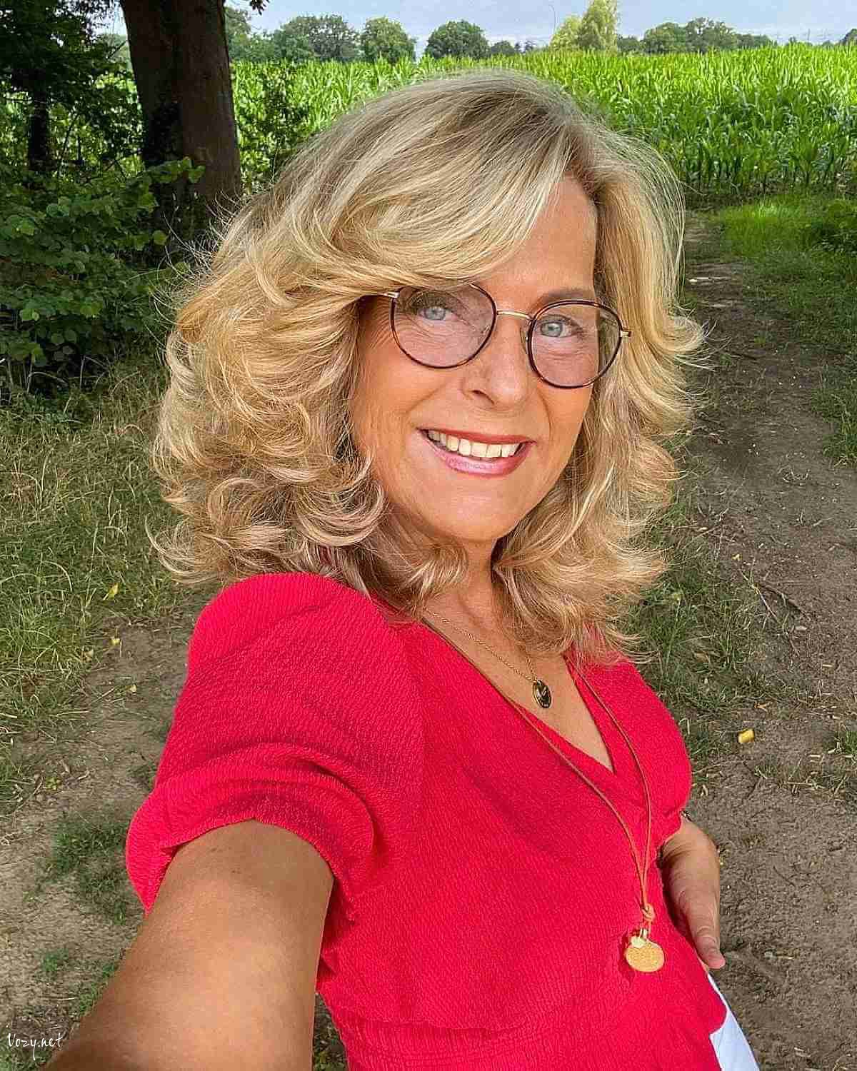 shoulder length blonde feathered hair with short layers for 50 year olds
