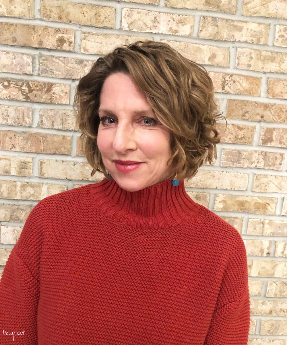 side parted angled bob for woman aged 50 with round face