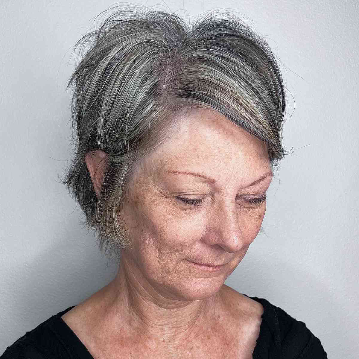 side parted long pixie cut for 50 year olds with thin hair