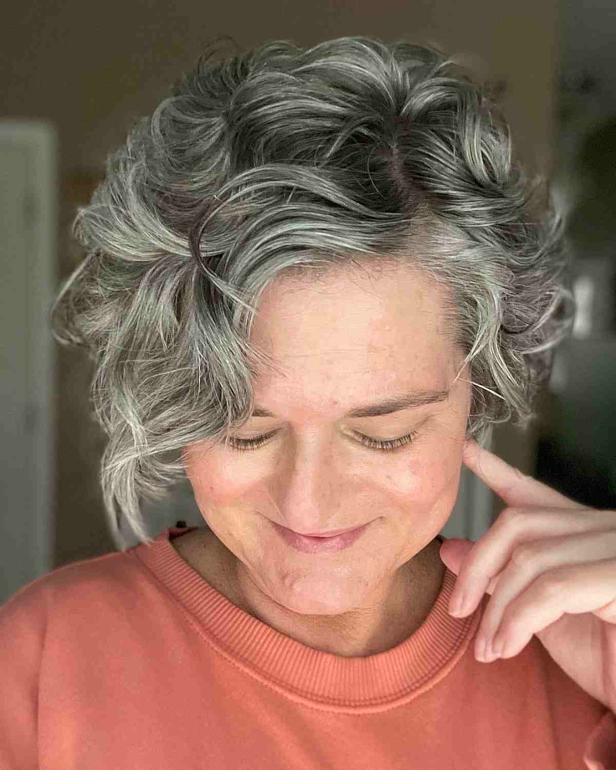side parted wavy pixie bob on grey haired ladies over 50