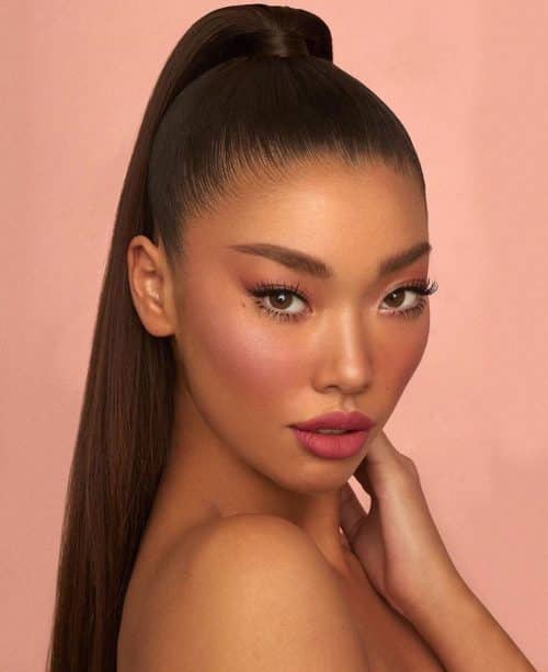 sleek ponytail for oval faces 500x613 1