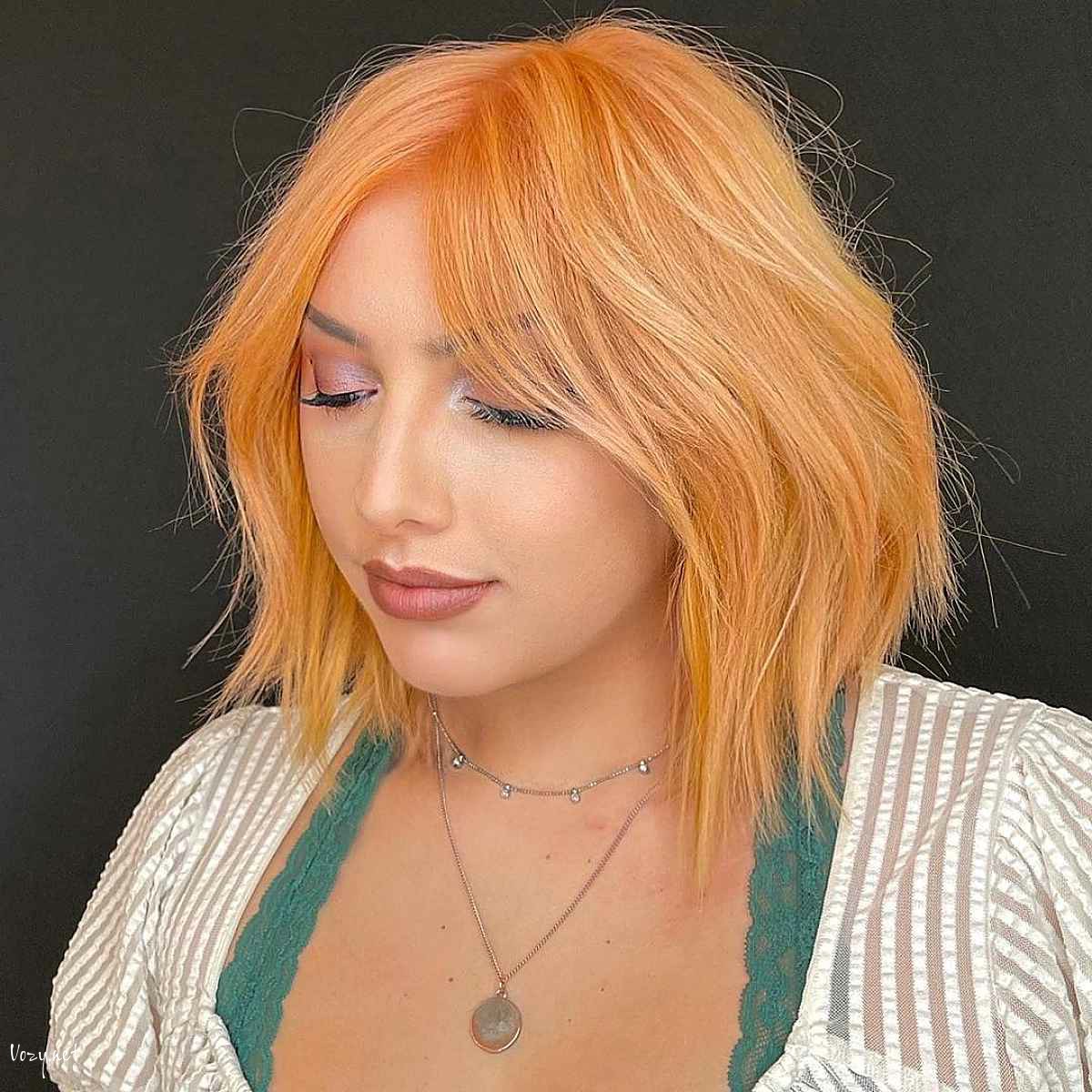 slimming collarbone length haircut for chubby faces