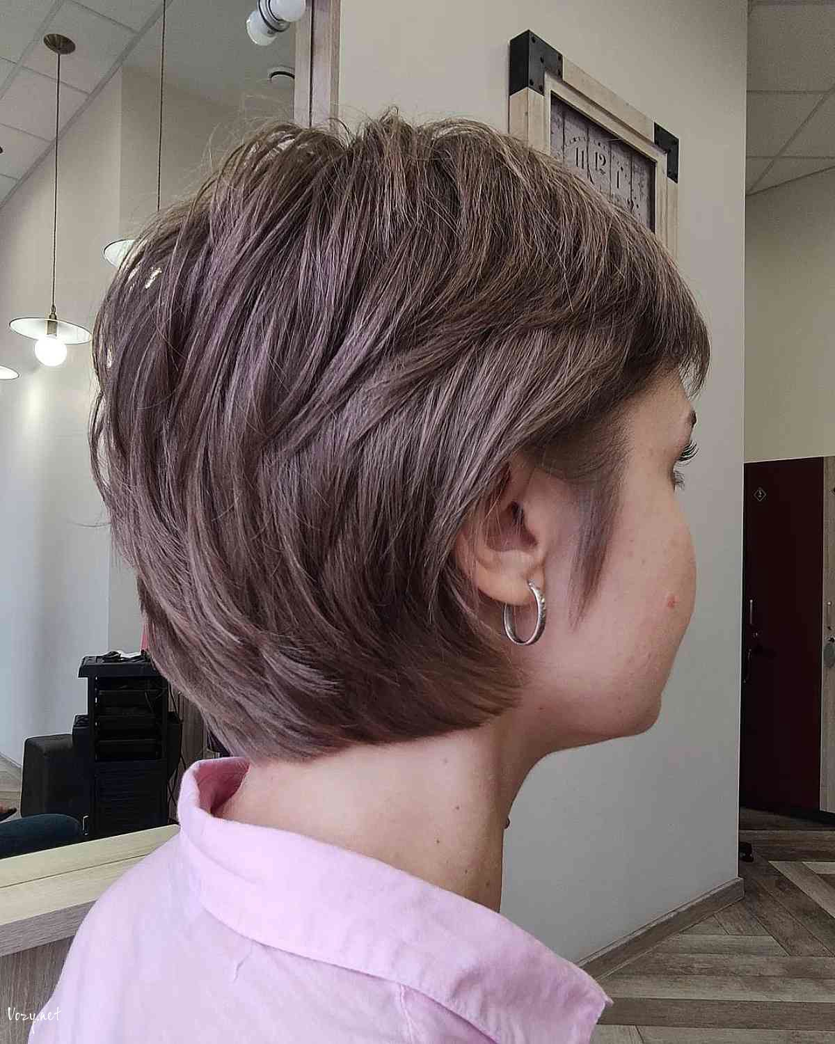 soft brunette long pixie bob cut