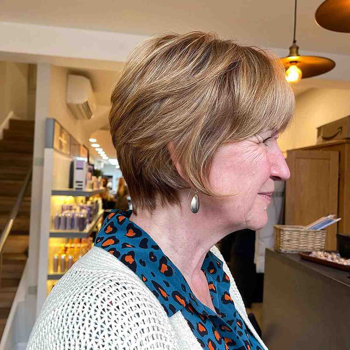 soft textured bixie with bangs for fifty year olds