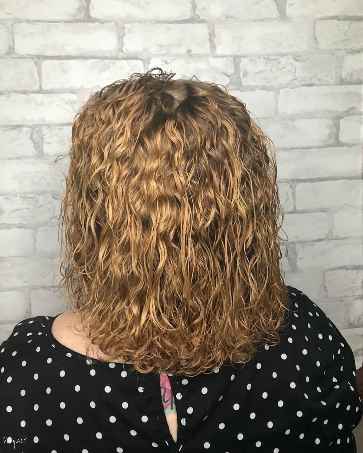 spiral body perm on shoulder length hair