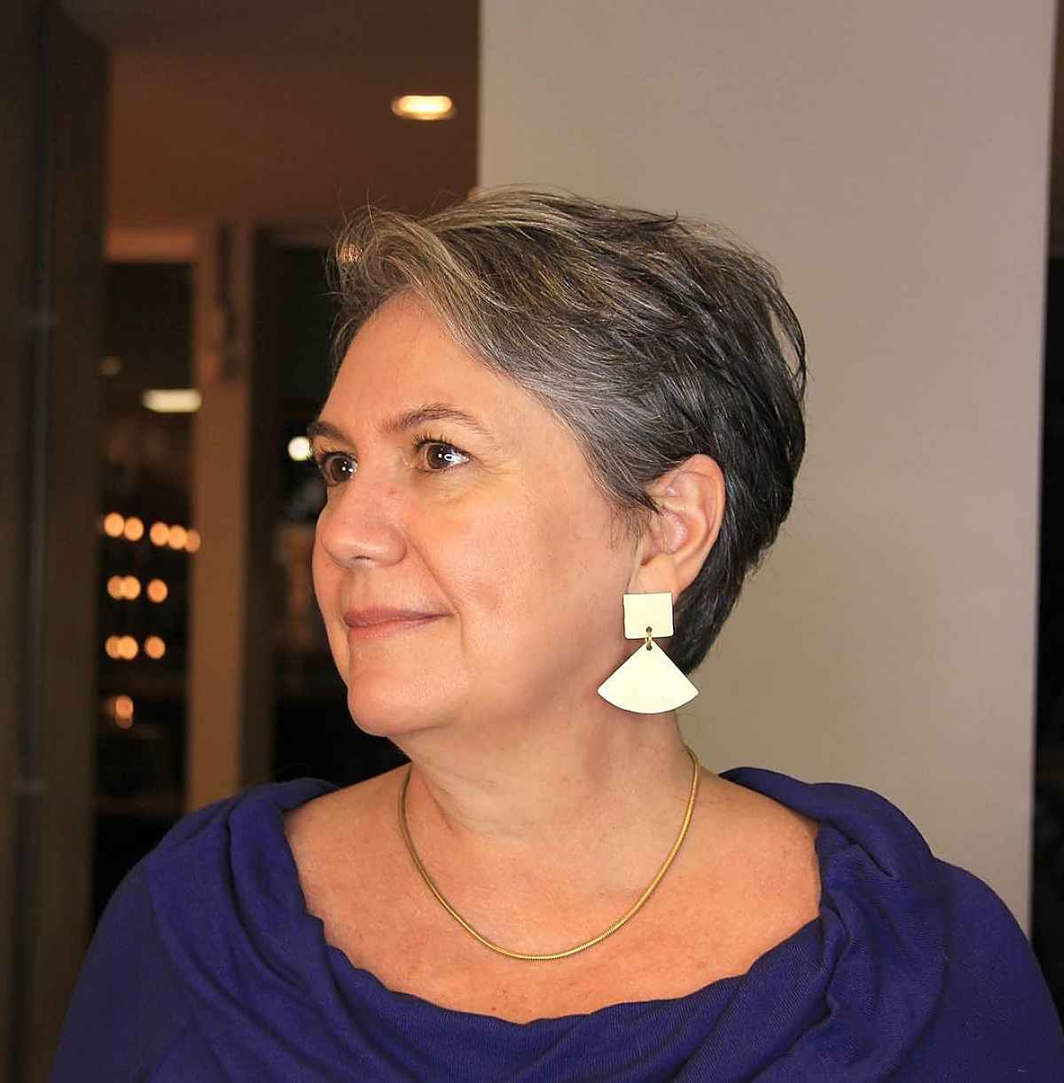 stacked pixie cut with soft layers for woman over 50 with thin hair