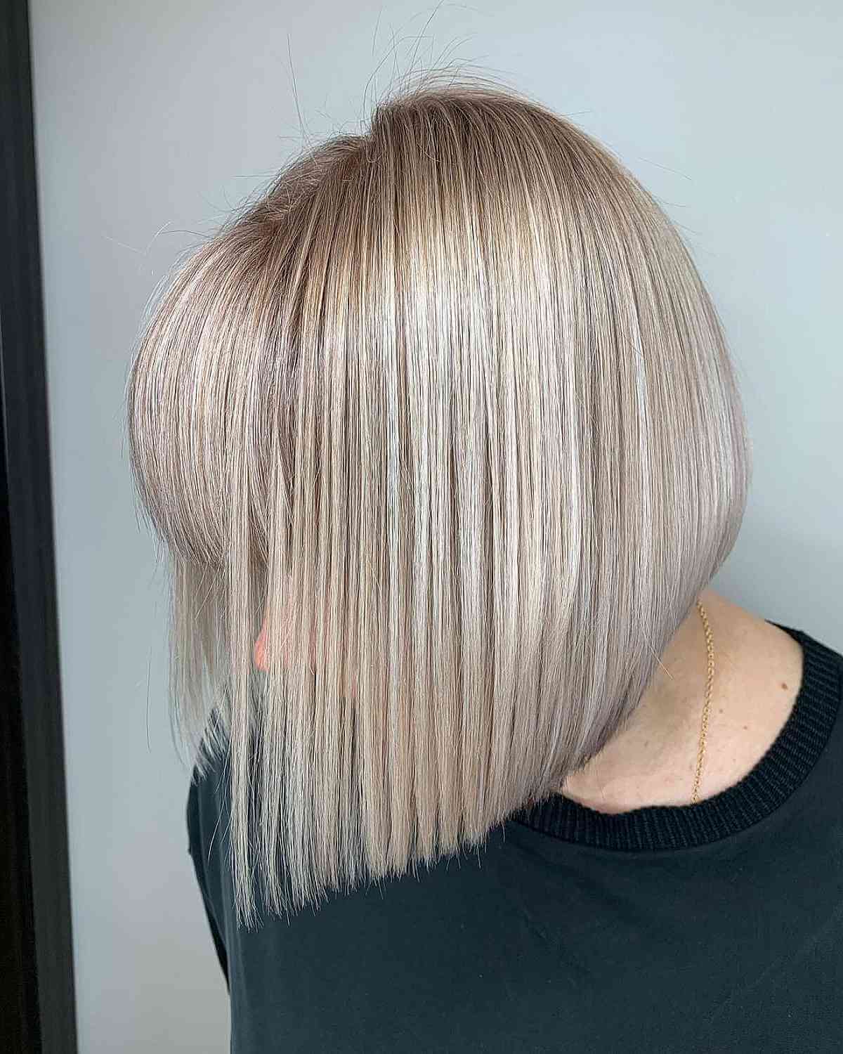 straight bob with full bangs for a 50 year old with fine hair
