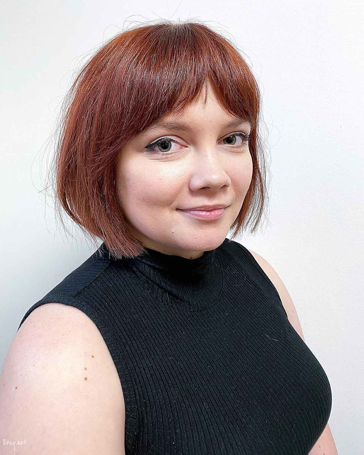 straight curtain bangs on a short cut