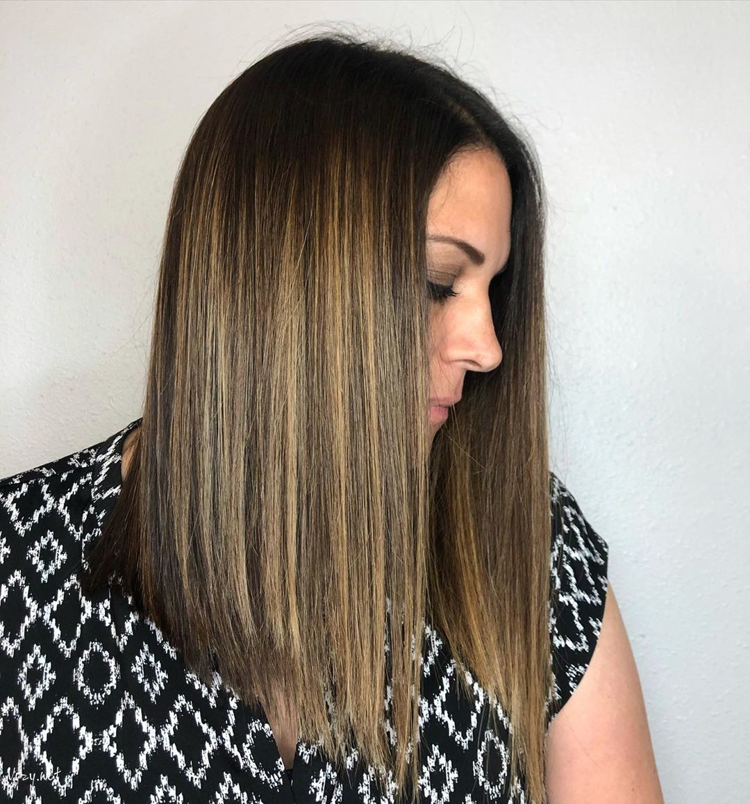 straight long bob for woman over 50 years old with thick hair