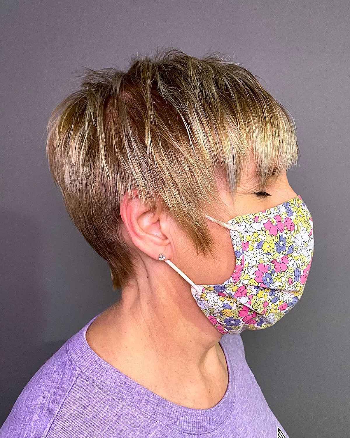 straight pixie style with choppy layers for woman over 50 with thin hair