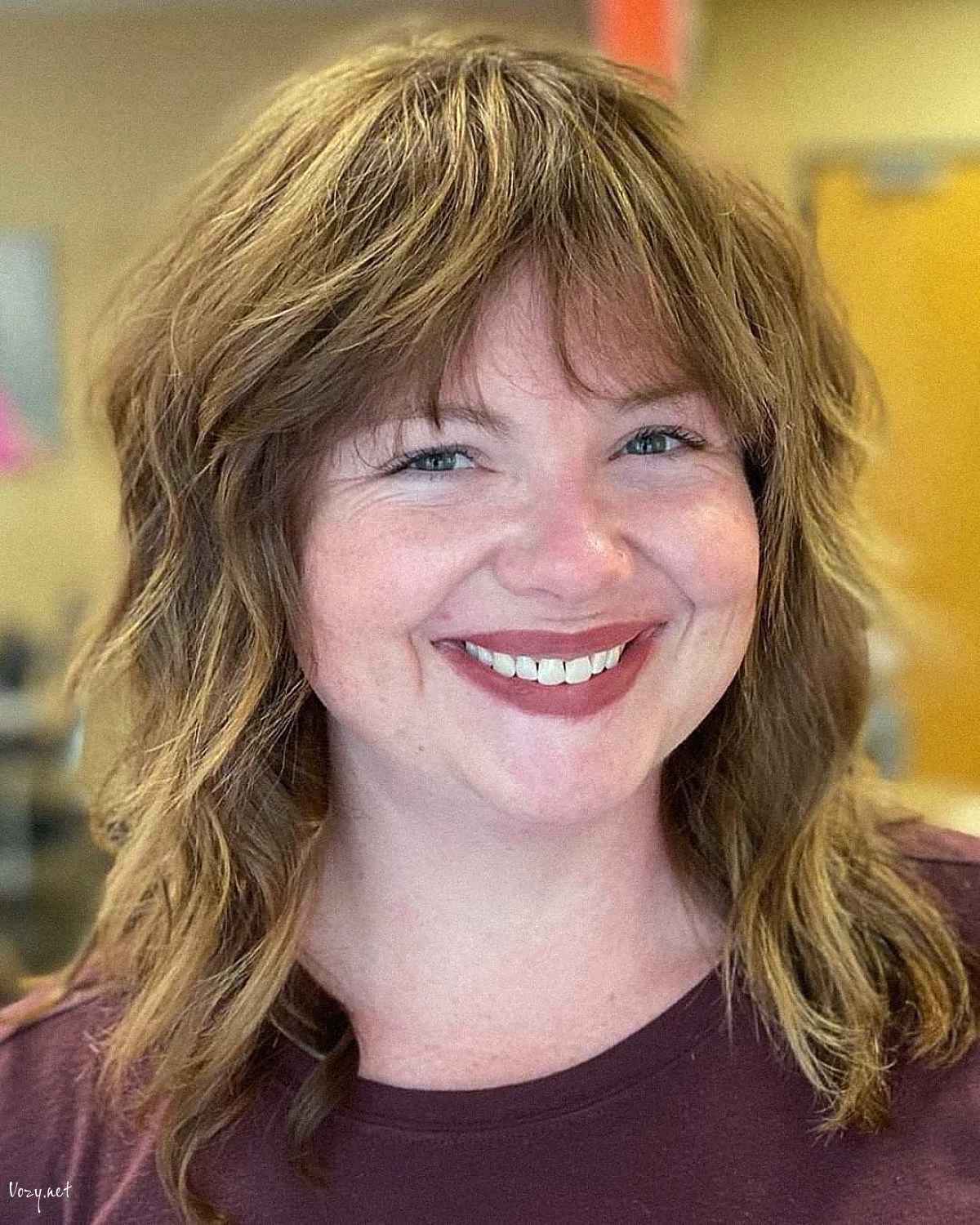 textured shaggy cut for a soft jawline
