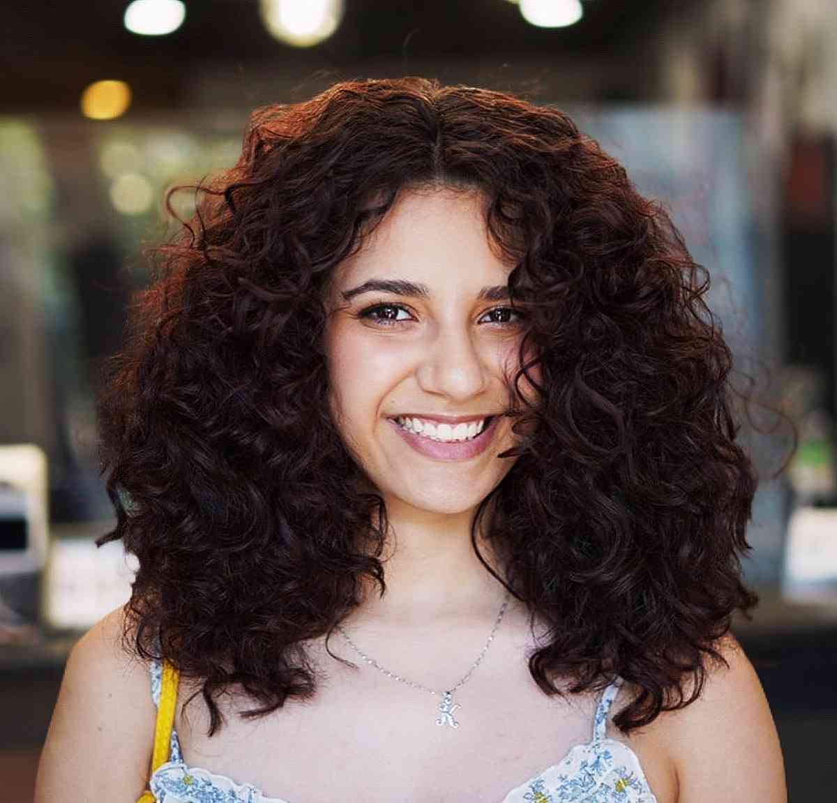 thick and full curls for medium length hair