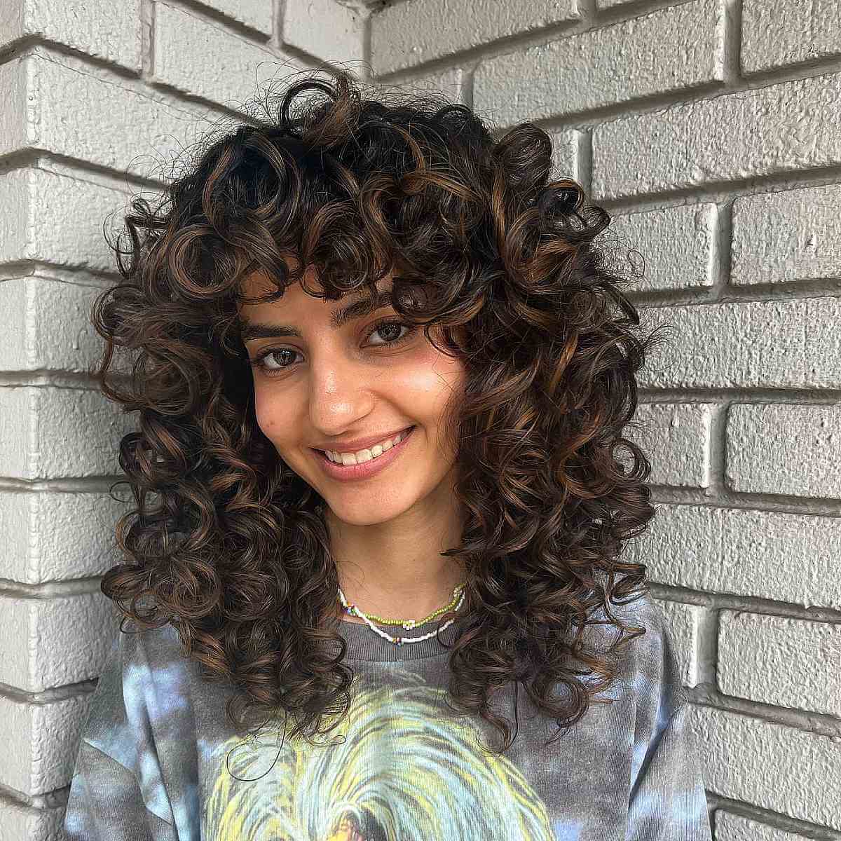 thick shoulder length curls