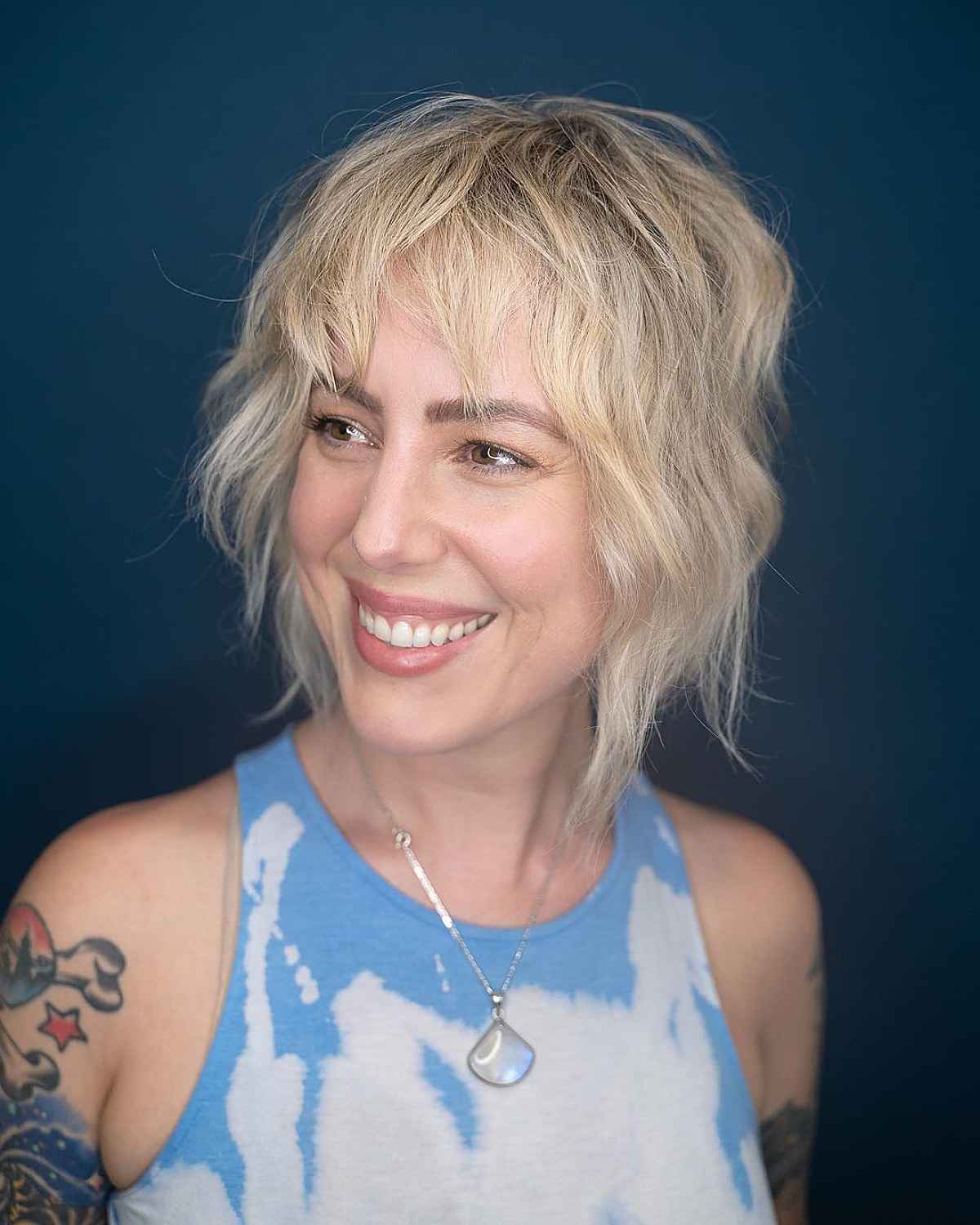 touchable short shag with volume hairstyle