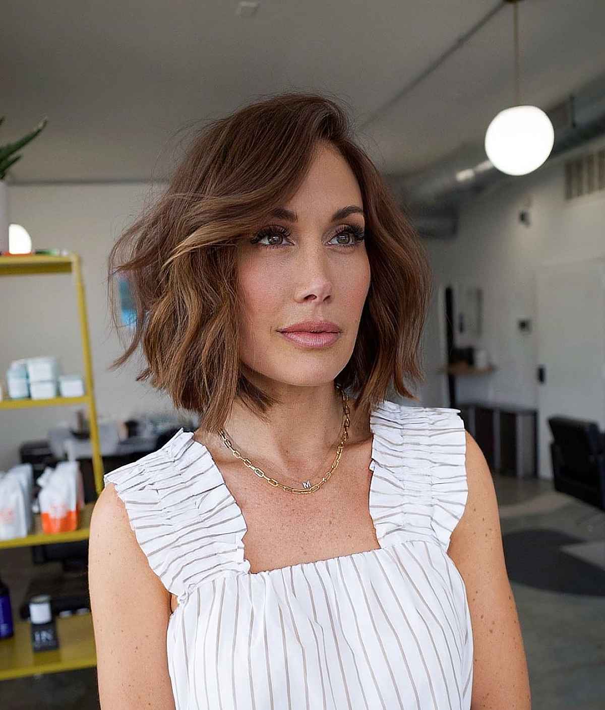 tousled bob with soft waves for ladies over forty
