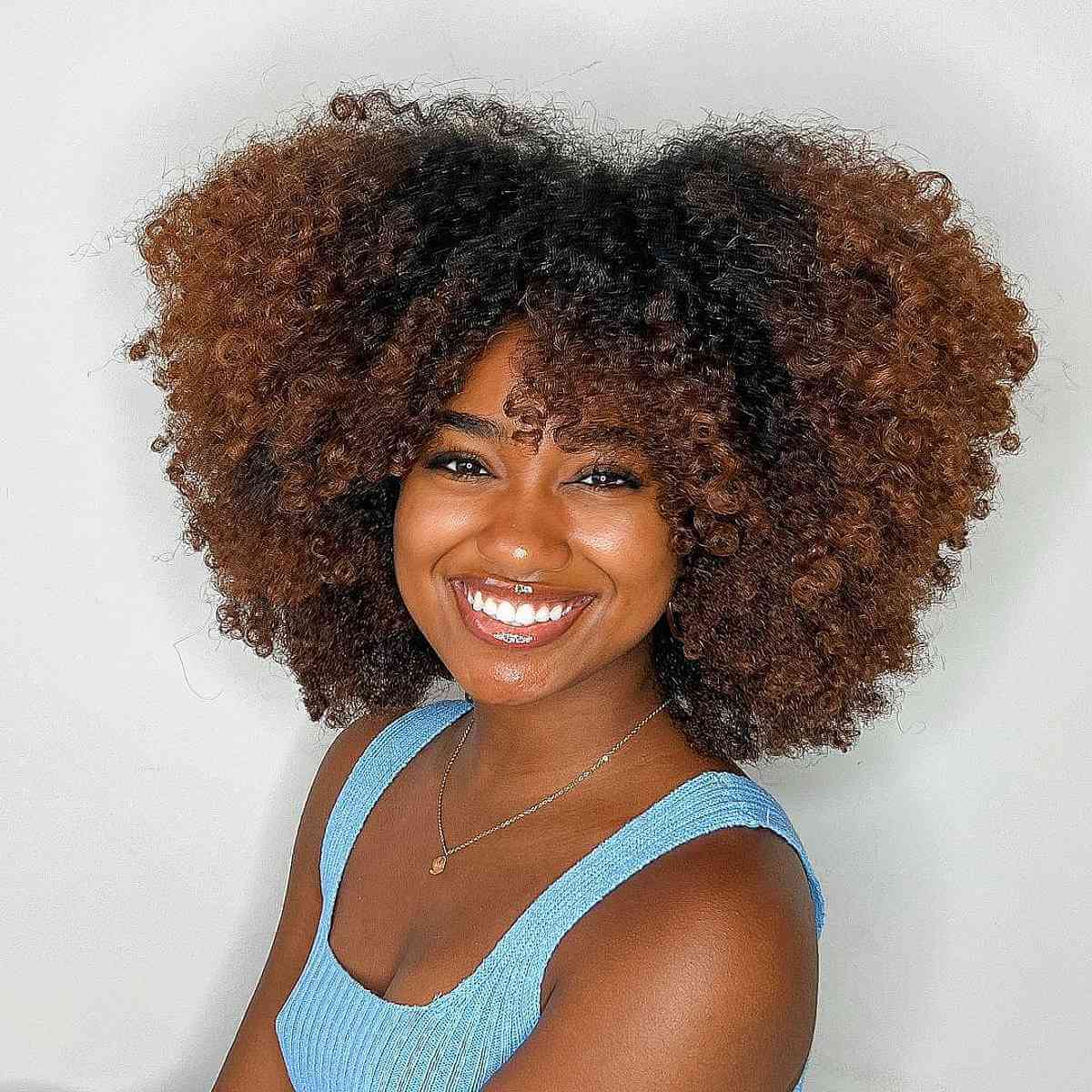 wash and go kinky black hair with bangs
