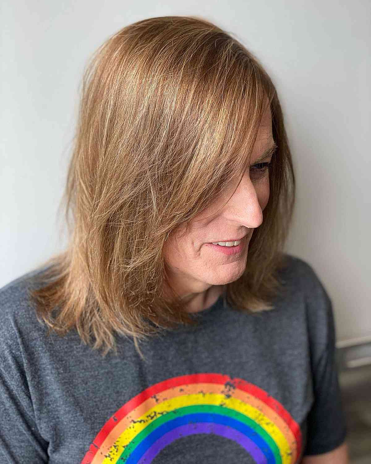 wash and go long bob with wispy layers for women over 50