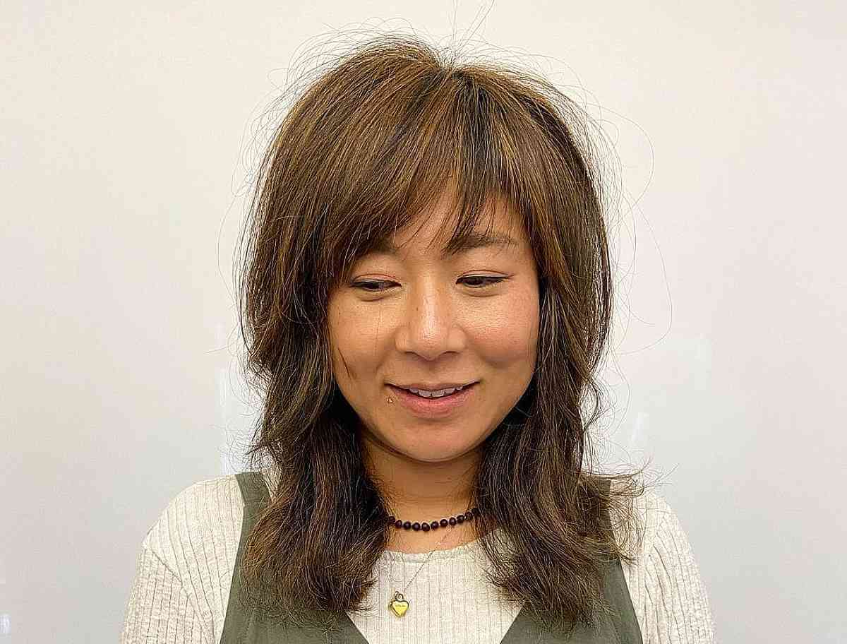 wash and wear shaggy layers with wispy bangs