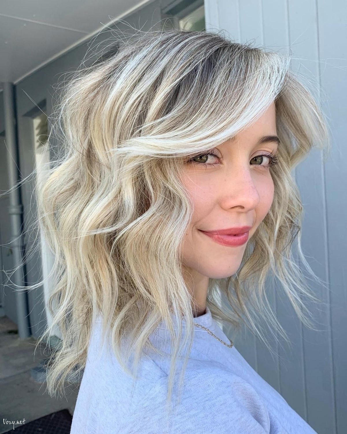 wavy medium shag with side swept bangs